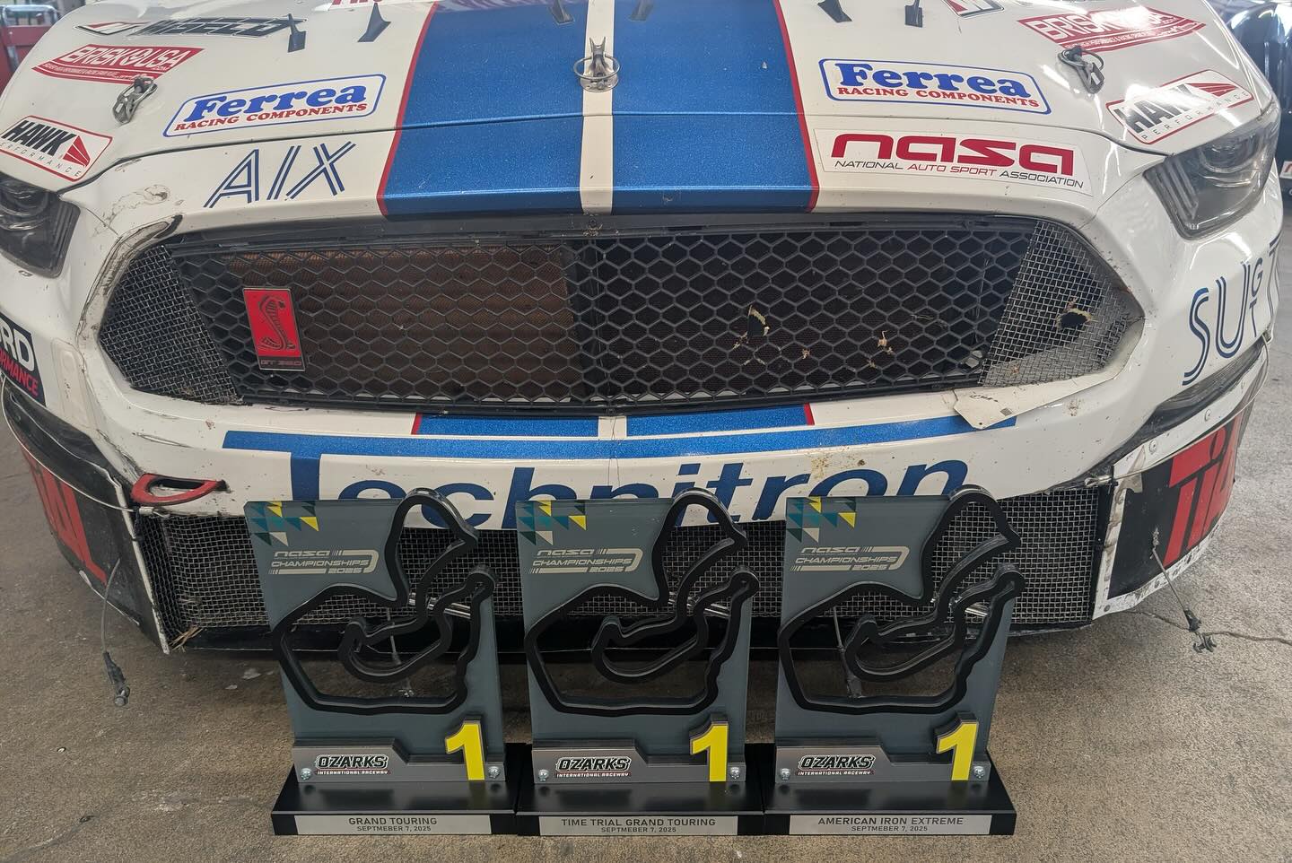 All three NASA National Championship trophies from Paul's Automotive Engineering's historic 2025 season